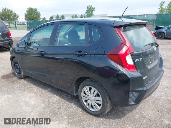 2015 Honda Fit LX with VIN 3HGGK5H56FM724269, listed as a IAAI auction lot 42540407 with 113,702 mi miles and . Bid and sale history available at DreamBid. Image 3.