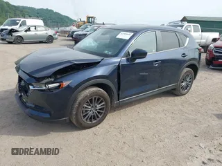 2021 Mazda CX-5 Touring z VIN JM3KFBCMXM0389857, wystawiony jako IAAI lot #42309650 z przebiegiem 49 938 mil mil oraz . Historia ofert i sprzedaży dostępna na DreamBid. Obrazek 17.