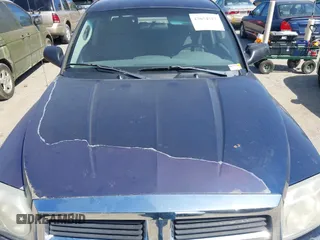 2006 Dodge Dakota SLT with VIN 1D7HW48NX6S708140, listed as a IAAI auction lot 42054527 with 226,944 mi miles and . Bid and sale history available at carsss.com. Image 10.
