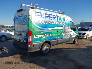 2019 Ford Transit with VIN 1FTYR2CM6KKA92080, listed as a IAAI auction lot 40863954 with 146,821 mi miles and . Bid and sale history available at DreamBid. Image 4.