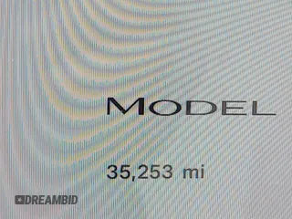 2023 Tesla Model Y Long Range with VIN 7SAYGDEE1PA169031, listed as a IAAI auction lot 41660766 with 35,253 mi miles and . Bid and sale history available at DreamBid. Image 16.