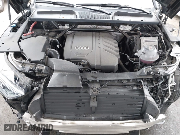 2023 Audi Q5 Premium Plus z VIN WA1BBAFY7P2187588, wystawiony jako IAAI lot #42052046 z przebiegiem 18 987 mil mil oraz . Historia ofert i sprzedaży dostępna na DreamBid. Obrazek 10.