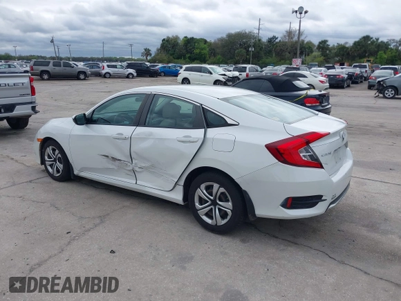 2020 Honda Civic LX with VIN 2HGFC2F69LH521681, listed as a IAAI auction lot 41664332 with 37,038 mi miles and . Bid and sale history available at DreamBid. Image 3.