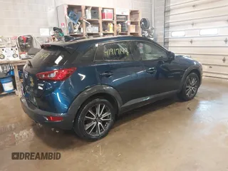 2017 Mazda CX-3 Touring with VIN JM1DKFC72H0145267, listed as a IAAI auction lot 41917149 with 55,784 mi miles. Bid and sale history available at carsss.com. Image 4.