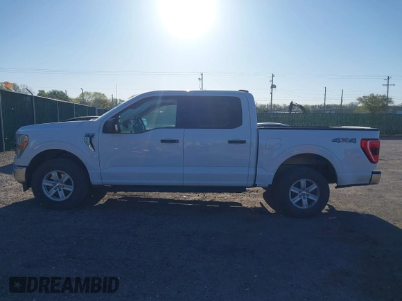 2021 Ford F-150 XL with VIN 1FTEW1EP5MKE25613, listed as a IAAI auction lot 42028237 with 116,341 mi miles. Bid and sale history available at carsss.com. Image 14.