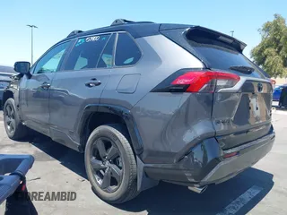 2021 Toyota RAV4 Hybrid XSE with VIN 2T3E6RFVXMW016803, listed as a IAAI auction lot 42135617 with 40,898 mi miles and . Bid and sale history available at DreamBid. Image 3.