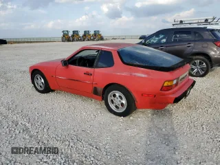 1987 Porsche 944 z VIN WP0AB0946HN476255, wystawiony jako Copart lot #79870704 z przebiegiem 177 672 mil mil oraz Czysty tytuł • Clean title. Historia ofert i sprzedaży dostępna na DreamBid. Obrazek 2.