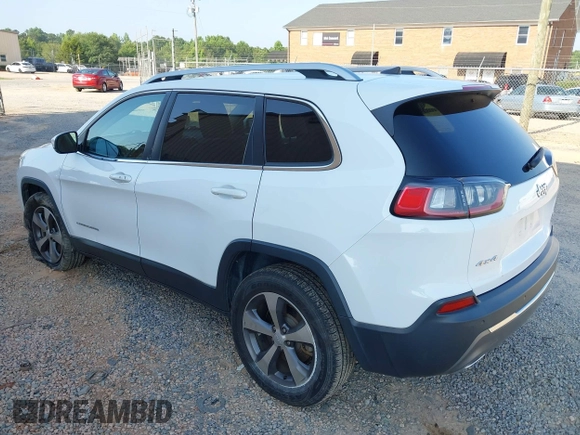 2020 Jeep Cherokee Limited with VIN 1C4PJMDXXLD612052, listed as a IAAI auction lot 42582343 with 96,072 mi miles and . Bid and sale history available at DreamBid. Image 3.