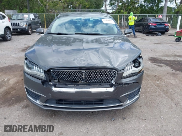 2017 Lincoln MKZ Hybrid Premiere с VIN 3LN6L5KU7HR634671, выставлен на аукционе IAAI как лот 42074134 с пробегом 105 850 миль миль и . История ставок и продаж доступна на DreamBid. Изображение 6.