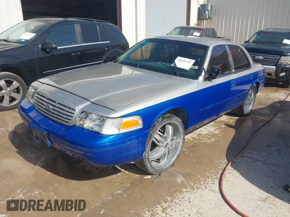 1999 Ford Crown Victoria Police z VIN 2FAFP71W5XX192230, wystawiony jako IAAI lot #41629743 z przebiegiem 170 510 mil mil oraz . Historia ofert i sprzedaży dostępna na DreamBid. Obrazek 2.