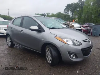 2011 Mazda 2 Sport with VIN JM1DE1HY1B0127409, listed as a IAAI auction lot 42015727 with 154,385 mi miles. Bid and sale history available at carsss.com. Image 1.