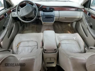 2004 Cadillac DeVille z VIN 1G6KD54Y64U134605, wystawiony jako Copart lot #56258215 z przebiegiem 256 662 mil mil oraz Szkody całkowita. Historia ofert i sprzedaży dostępna na DreamBid. Obrazek 8.