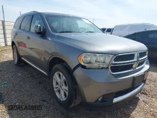 2011 Dodge Durango Crew with VIN 1D4RD4GG3BC729393, listed as a IAAI auction lot 41899010 with 174,392 mi miles and . Bid and sale history available at carsss.com. Image 1.