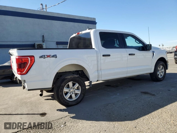 2022 Ford F-150 XL with VIN 1FTEW1EB9NKE67725, listed as a Copart auction lot 82253604 with 14,760 mi miles and Salvage Title. Bid and sale history available at carsss.com. Image 3.