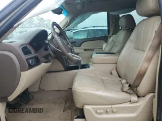 2011 GMC Yukon XL SLT with VIN 1GKS1KE01BR203962, listed as a Copart auction lot 80726164 with 199,112 mi miles and Salvage Title. Bid and sale history available at DreamBid. Image 7.