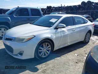 2013 Toyota Avalon XLE with VIN 4T1BK1EB3DU004802, listed as a IAAI auction lot 41469831 with 215,235 mi miles and . Bid and sale history available at DreamBid. Image 2.