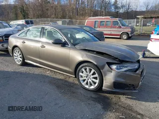 2016 Audi A6 Premium Plus z VIN WAUGFAFC1GN128729, wystawiony jako IAAI lot #41770535 z przebiegiem 45 825 mil mil oraz . Historia ofert i sprzedaży dostępna na DreamBid. Obrazek 1.