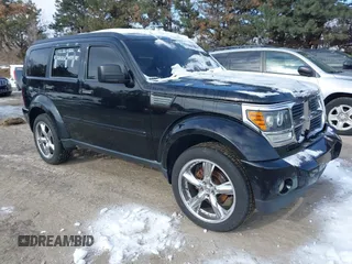 2007 Dodge Nitro SLT with VIN 1D8GU58K97W583862, listed as a IAAI auction lot 41378801 with 227,713 mi miles. Bid and sale history available at carsss.com. Image 1.