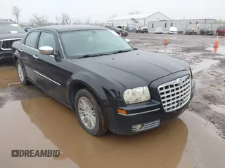 2010 Chrysler 300 Touring with VIN 2C3CA5CV5AH144949, listed as a IAAI auction lot 41955931 with 236,658 mi miles. Bid and sale history available at carsss.com. Image 1.