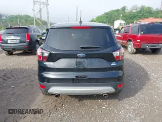 2017 Ford Escape SE with VIN 1FMCU9GD0HUC62616, listed as a IAAI auction lot 42194561 with 97,897 mi miles and . Bid and sale history available at DreamBid. Image 16.