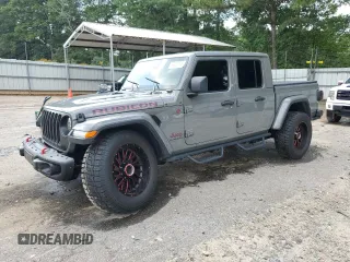 2021 Jeep Gladiator Rubicon z VIN 1C6JJTBG5ML507579, wystawiony jako Copart lot #60409785 z przebiegiem 62 585 mil mil oraz Szkoda całkowita • Salvage title. Historia ofert i sprzedaży dostępna na DreamBid. Obrazek 1.