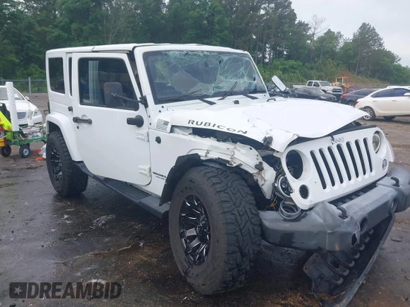 2016 Jeep Wrangler Unlimited Rubicon Hard Rock with VIN 1C4BJWFG3GL228449, listed as a IAAI auction lot 42158318 with Not provided miles and . Bid and sale history available at DreamBid. Image 1.