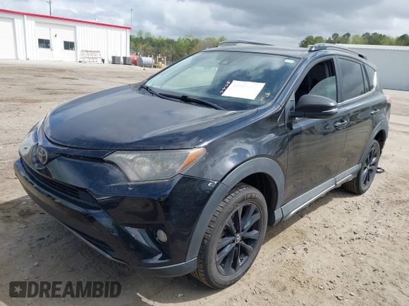 2018 Toyota RAV4 XLE with VIN 2T3RFREV1JW697044, listed as a IAAI auction lot 41891412 with 140,145 mi miles. Bid and sale history available at carsss.com. Image 2.