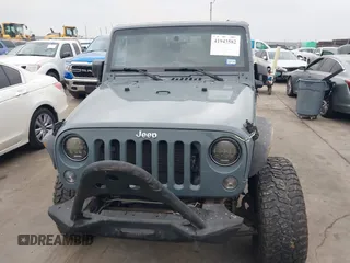 2015 Jeep Wrangler Sport with VIN 1C4GJWAG7FL585631, listed as a IAAI auction lot 41943582 with 88,649 mi miles and . Bid and sale history available at DreamBid. Image 12.