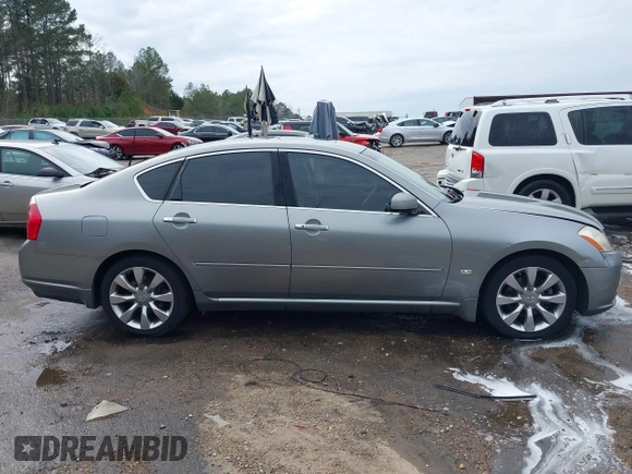 2007 Infiniti M Sport z VIN JNKAY01E47M308944, wystawiony jako IAAI lot #41514395 z przebiegiem 166 936 mil mil oraz . Historia ofert i sprzedaży dostępna na DreamBid. Obrazek 13.