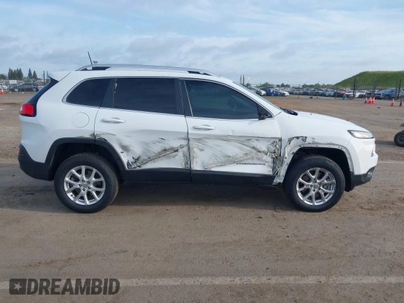 2016 Jeep Cherokee Latitude with VIN 1C4PJMCS1GW185442, listed as a IAAI auction lot 42033699 with 123,306 mi miles. Bid and sale history available at carsss.com. Image 13.