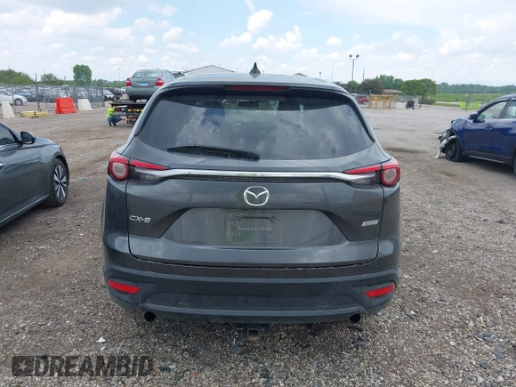 2016 Mazda CX-9 Sport z VIN JM3TCABYXG0126543, wystawiony jako IAAI lot #42256448 z przebiegiem 133 813 mil mil oraz . Historia ofert i sprzedaży dostępna na DreamBid. Obrazek 16.
