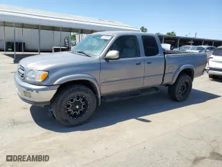 2001 Toyota Tundra Ltd with VIN 5TBBT481X1S165114, listed as a Copart auction lot 54163185 with 234,233 mi miles and Clean Title. Bid and sale history available at carsss.com. Image 1.
