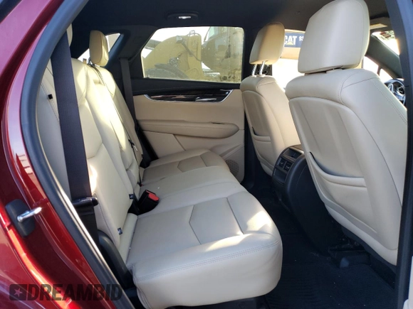 2018 Cadillac XT5 FWD with VIN 1GYKNARS2JZ241702, listed as a Copart auction lot 84031294 with 67,866 mi miles and Salvage title. Bid and sale history available at DreamBid. Image 11.