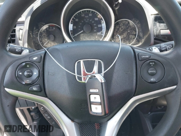 2015 Honda Fit EX-L with VIN 3HGGK5H88FM729435, listed as a IAAI auction lot 41998376 with 130,723 mi miles. Bid and sale history available at carsss.com. Image 11.