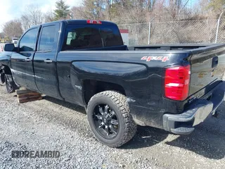 2014 Chevrolet Silverado 1500 LT with VIN 1GCVKREH4EZ338281, listed as a IAAI auction lot 41581754 with 126,786 mi miles and . Bid and sale history available at DreamBid. Image 3.