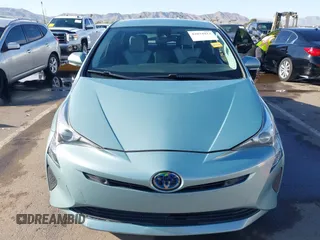 2018 Toyota Prius Two with VIN JTDKBRFUXJ3066430, listed as a IAAI auction lot 42034812 with 119,711 mi miles and . Bid and sale history available at carsss.com. Image 12.