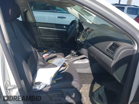 2009 Volkswagen Jetta z VIN 3VWTZ71K39M286381, wystawiony jako IAAI lot #42126439 z przebiegiem 138 297 mil mil oraz . Historia ofert i sprzedaży dostępna na DreamBid. Obrazek 5.