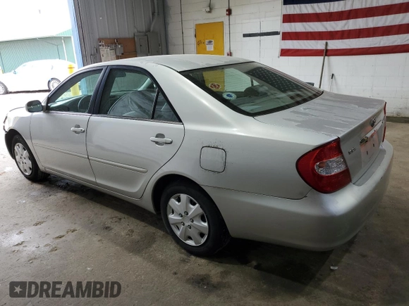 2003 Toyota Camry LE with VIN 4T1BE32K33U710903, listed as a Copart auction lot 56976585 with 157,444 mi miles and Clean Title. Bid and sale history available at DreamBid. Image 2.