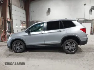 2021 Honda Passport EX-L with VIN 5FNYF8H56MB000107, listed as a IAAI auction lot 41868429 with 66,572 mi miles and . Bid and sale history available at DreamBid. Image 15.