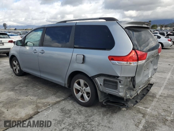 2011 Toyota Sienna LE AAS with VIN 5TDKK3DC3BS112395, listed as a Copart auction lot 48169005 with 179,801 mi miles and Salvage Title. Bid and sale history available at DreamBid. Image 2.