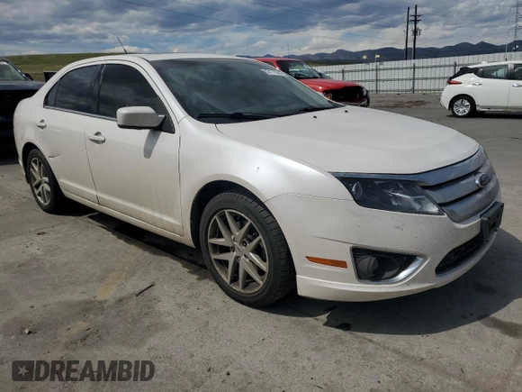 2012 Ford Fusion SEL z VIN 3FAHP0JAXCR282521, wystawiony jako Copart lot #53115505 z przebiegiem 96 833 mil mil oraz Szkoda całkowita • Salvage title. Historia ofert i sprzedaży dostępna na DreamBid. Obrazek 4.