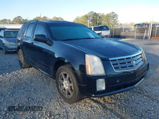 2004 Cadillac SRX with VIN 1GYDE63A040116714, listed as a IAAI auction lot 41828311 with 128,372 mi miles. Bid and sale history available at carsss.com. Image 1.