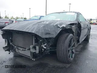 2019 Ford Mustang EcoBoost z VIN 1FA6P8TH2K5143582, wystawiony jako IAAI lot #42172259 z przebiegiem 53 614 mil mil oraz . Historia ofert i sprzedaży dostępna na DreamBid. Obrazek 6.