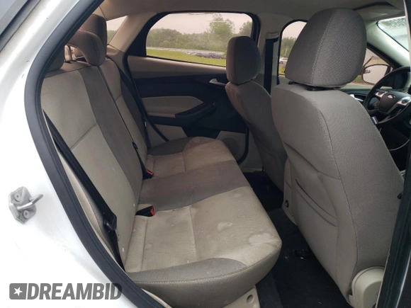 2013 Ford Focus SE z VIN 1FADP3F25DL204052, wystawiony jako Copart lot #57662695 z przebiegiem 124 916 mil mil oraz Szkoda całkowita • Salvage title. Historia ofert i sprzedaży dostępna na DreamBid. Obrazek 10.