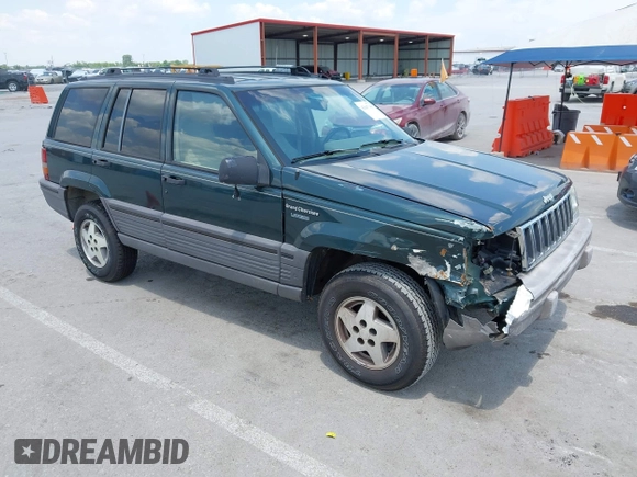1995 Jeep Grand Cherokee Laredo with VIN 1J4FX58S0SC716398, listed as a IAAI auction lot 42647346 with 58,184 mi miles and . Bid and sale history available at DreamBid. Image 1.