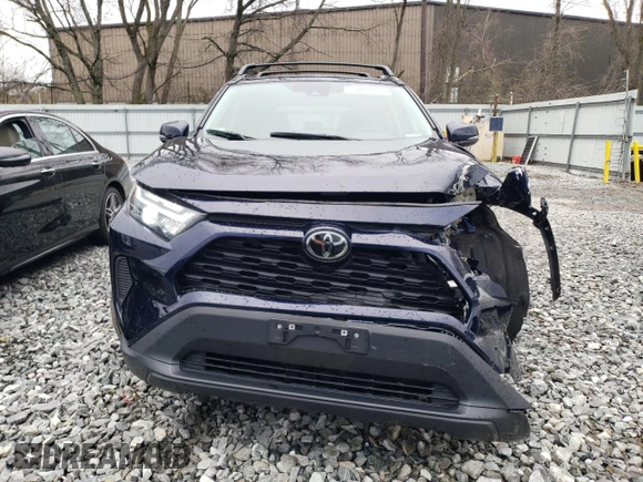 2023 Toyota RAV4 XLE with VIN 2T3P1RFV1PW363786, listed as a Copart auction lot 53697715 with 8,220 mi miles and Salvage title. Bid and sale history available at DreamBid. Image 5.