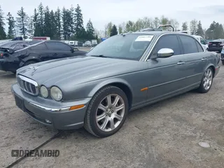 2004 Jaguar XJ with VIN SAJEA74C94SG10199, listed as a IAAI auction lot 42007186 with 138,807 mi miles and . Bid and sale history available at DreamBid. Image 2.
