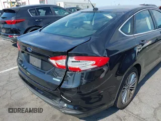 2015 Ford Fusion SE with VIN 3FA6P0HDXFR195603, listed as a IAAI auction lot 42761373 with 105,719 mi miles and . Bid and sale history available at DreamBid. Image 6.