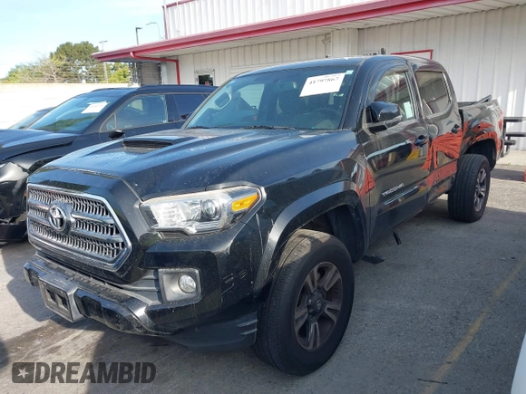 2017 Toyota Tacoma SR5 with VIN 5TFAZ5CN0HX053573, listed as a IAAI auction lot 41797867 with 102,628 mi miles and . Bid and sale history available at DreamBid. Image 19.