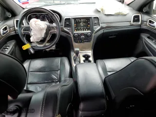 2017 Jeep Grand Cherokee Overland with VIN 1C4RJECG3HC868255, listed as a Copart auction lot 70207444 with 121,604 mi miles and Salvage Title. Bid and sale history available at carsss.com. Image 8.